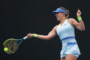 Dalma Galfi playing a backhand during the 2026 tennis qualifying round match